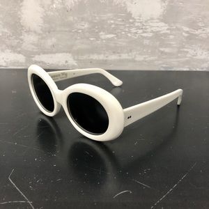 RAEN Figurative Oval Sunglasses